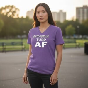 Graphic t-shirt featuring bold text reading “Anti Orange Turd AF”