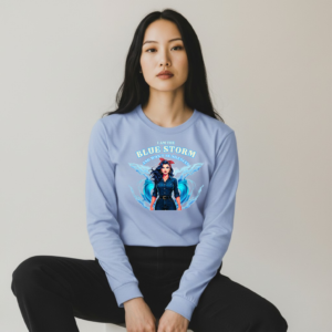 Long sleeve shirt featuring an illustrated woman framed by blue storm imagery with an empowering message about strength and being heard.