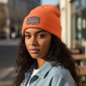 Cuffed beanie featuring the phrase “Chinga La Migra” on the front.