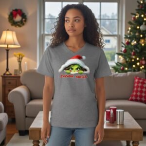 V-neck graphic t-shirt featuring a mischievous holiday character with satirical political text.