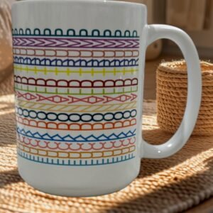 15oz ceramic mug with tribal-style geometric pattern forming FDT message