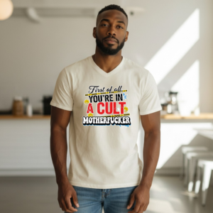 Graphic shirt reading “First of all, You’re in a Cult, Motherfucker” with warning-tape style design elements.