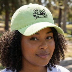 dad hat with rainbow-colored “FU47” lettering.