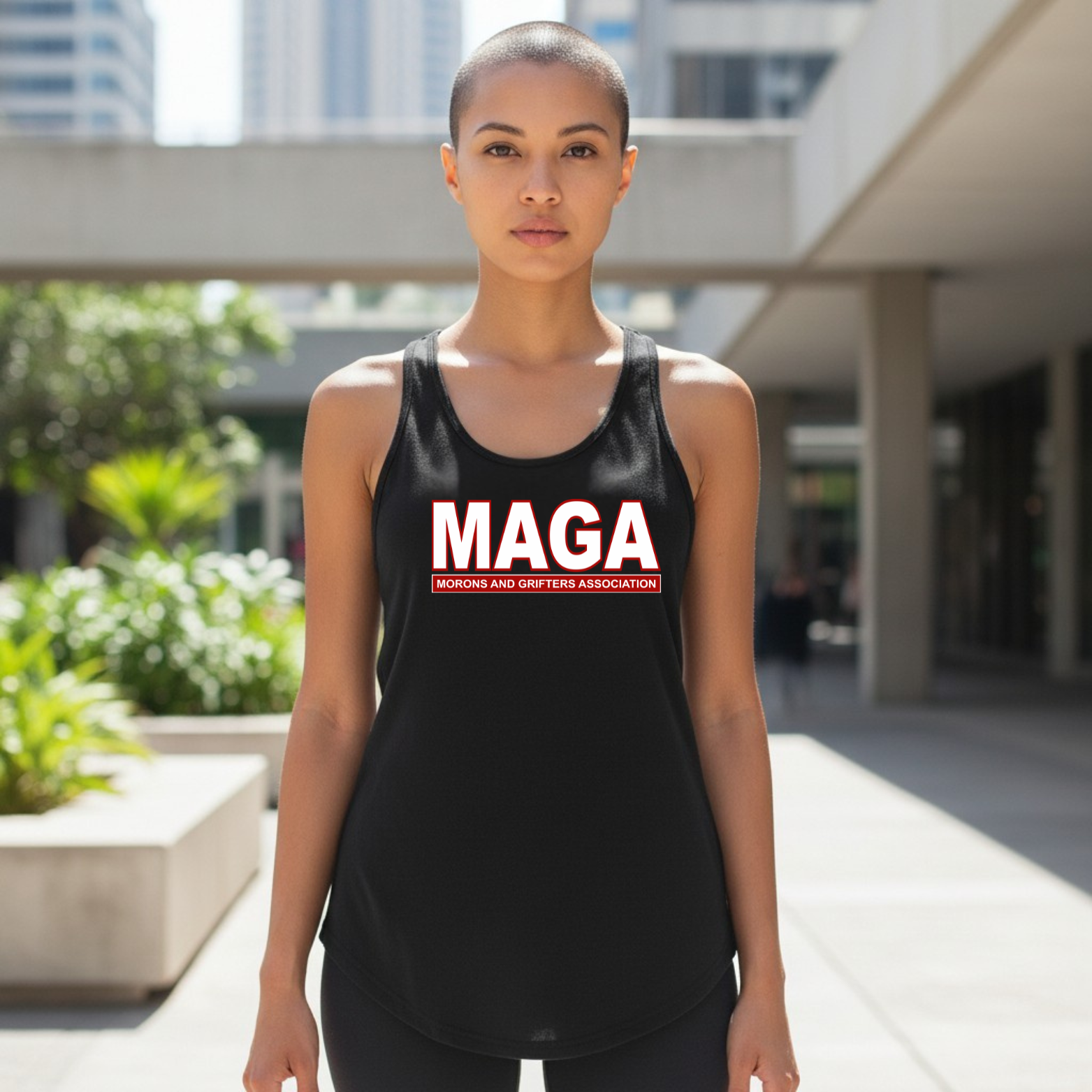 MAGAMoronsTank Racerback tank featuring the phrase MAGA Morons and Grifters Association in bold lettering