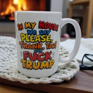 15oz ceramic mug with bold typography political statement design placed on a wooden tray in a cozy setting.
