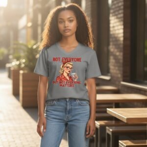 Graphic t-shirt featuring a retro-style illustrated character with a bold, humorous quote.