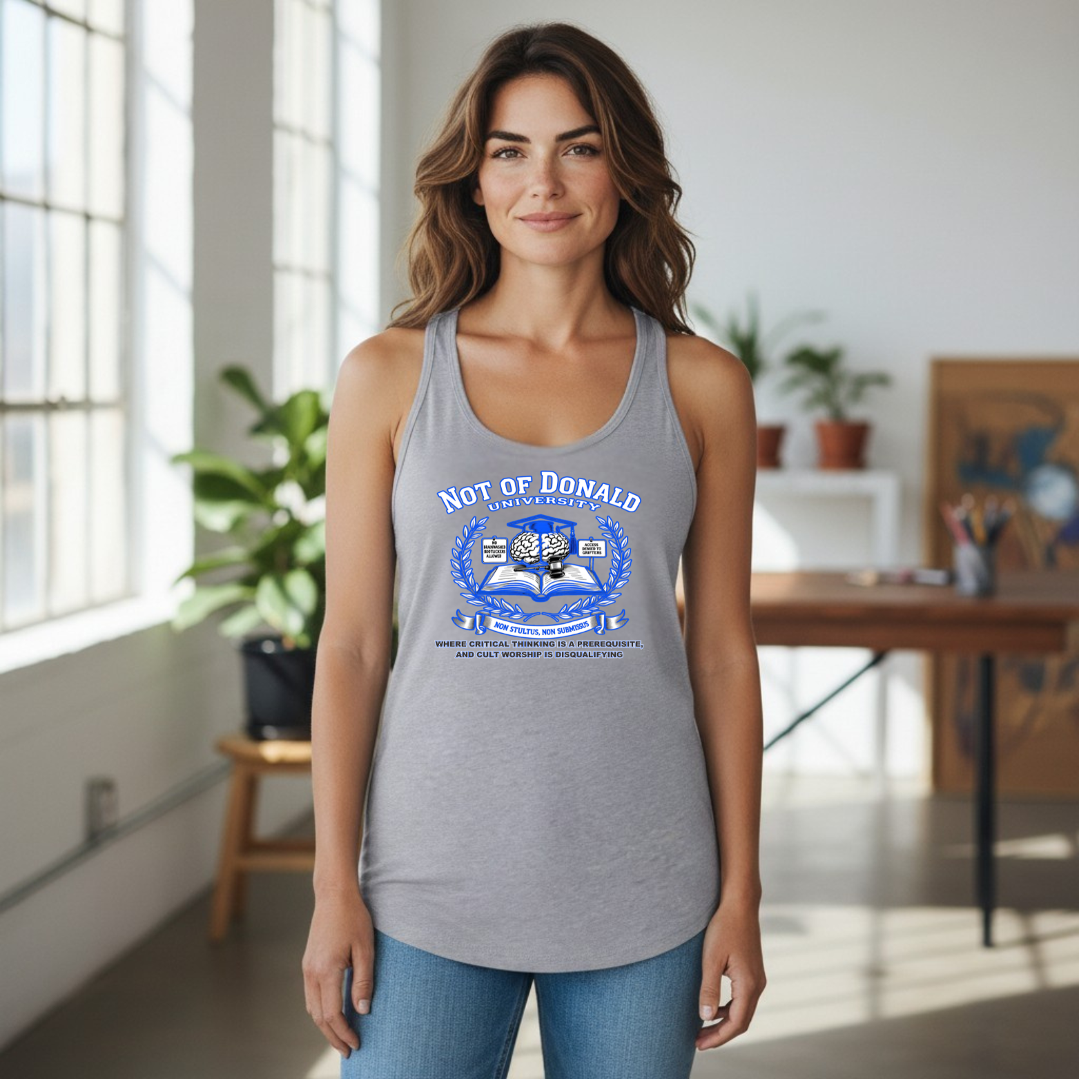 NotOfDonaldTank Racerback tank with satirical university-style political design and critical thinking message