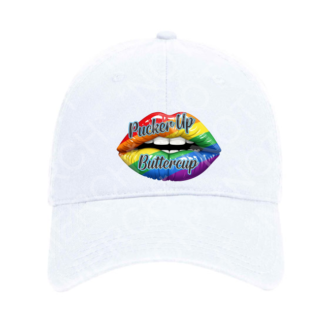 PukerUpHatWhite White dad hat with rainbow lips graphic and the phrase “Pucker Up Buttercup.”