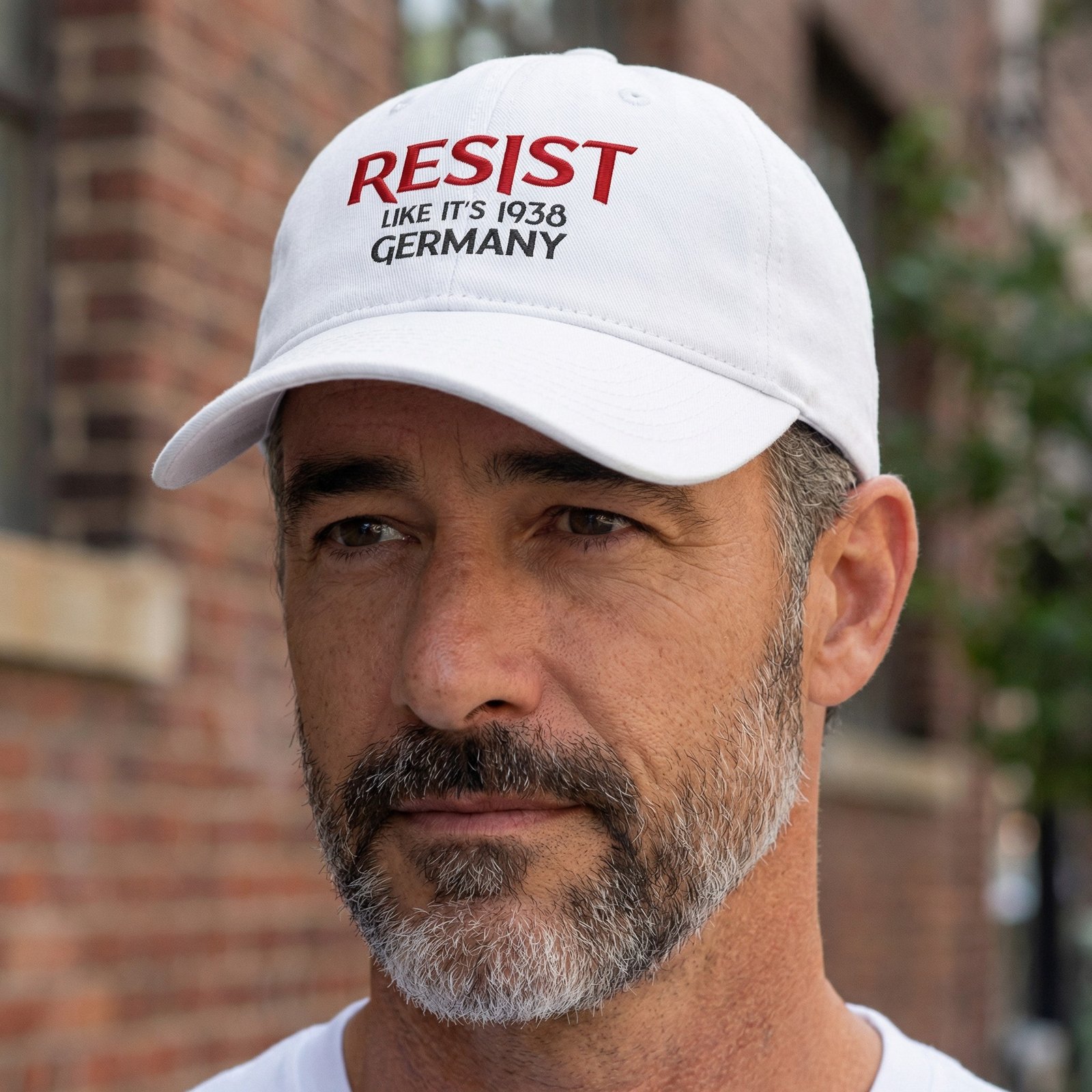 ResistGermanyHat Dad hat with the phrase “Resist Like It’s 1938 Germany” in bold typography.