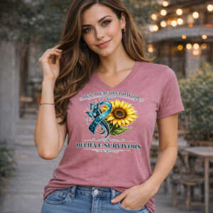 Graphic t-shirt featuring a sunflower and ribbon with a message supporting and believing survivors