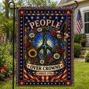 Sublimated patriotic garden flag with People Over Crowns Since 1776 text, eagle, and peace symbol artwork displayed outdoors.