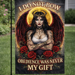 Sublimated gothic queen garden flag with wings, roses, and empowering rebellion quote displayed outdoors.