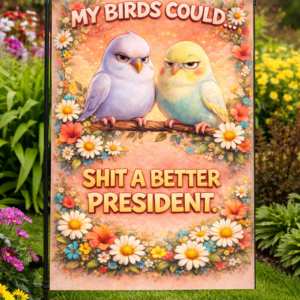 Sublimated funny bird garden flag with grumpy birds, floral artwork, and sarcastic political text displayed outdoors.