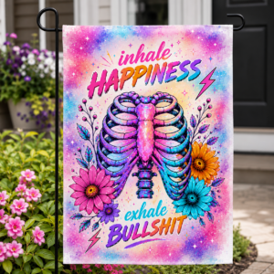 Colorful sublimated garden flag with ribcage artwork and inhale happiness exhale bullshit quote displayed outdoors.