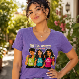 Woman wearing the Not Your Podcast Tea Trifecta t-shirt featuring illustrated versions of Christina, Jenni, and V.